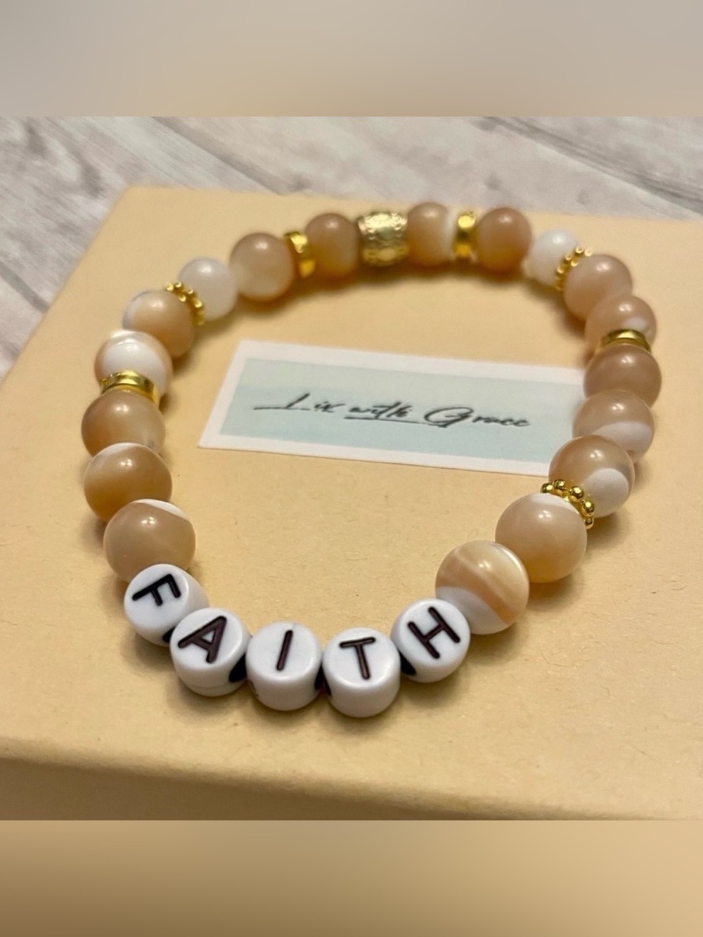 Faith Letter Bracelet Polished Mother of Pearl tan & white, stretch, gold, boxed